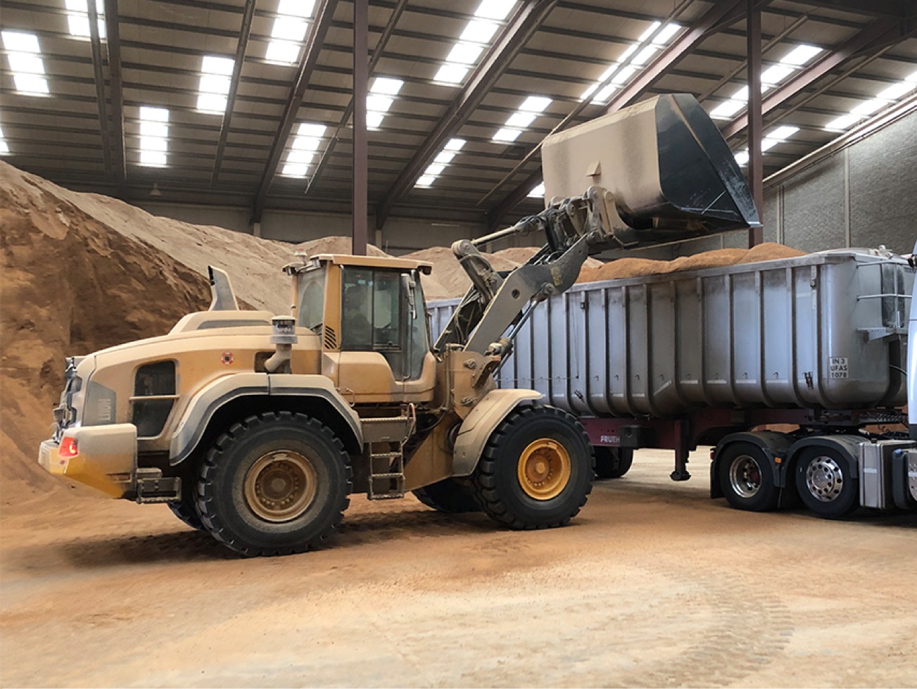 Stevedore loading lorry